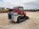 Used Takeuchi in yard
